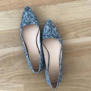 Black and white patterned flats